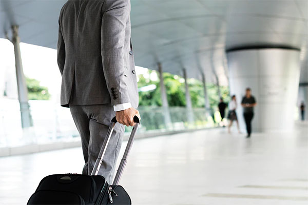 Business Traveller Trolley Airport immigration airport traveller