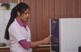 Rosemary Salin handling powder X-ray diffractometer