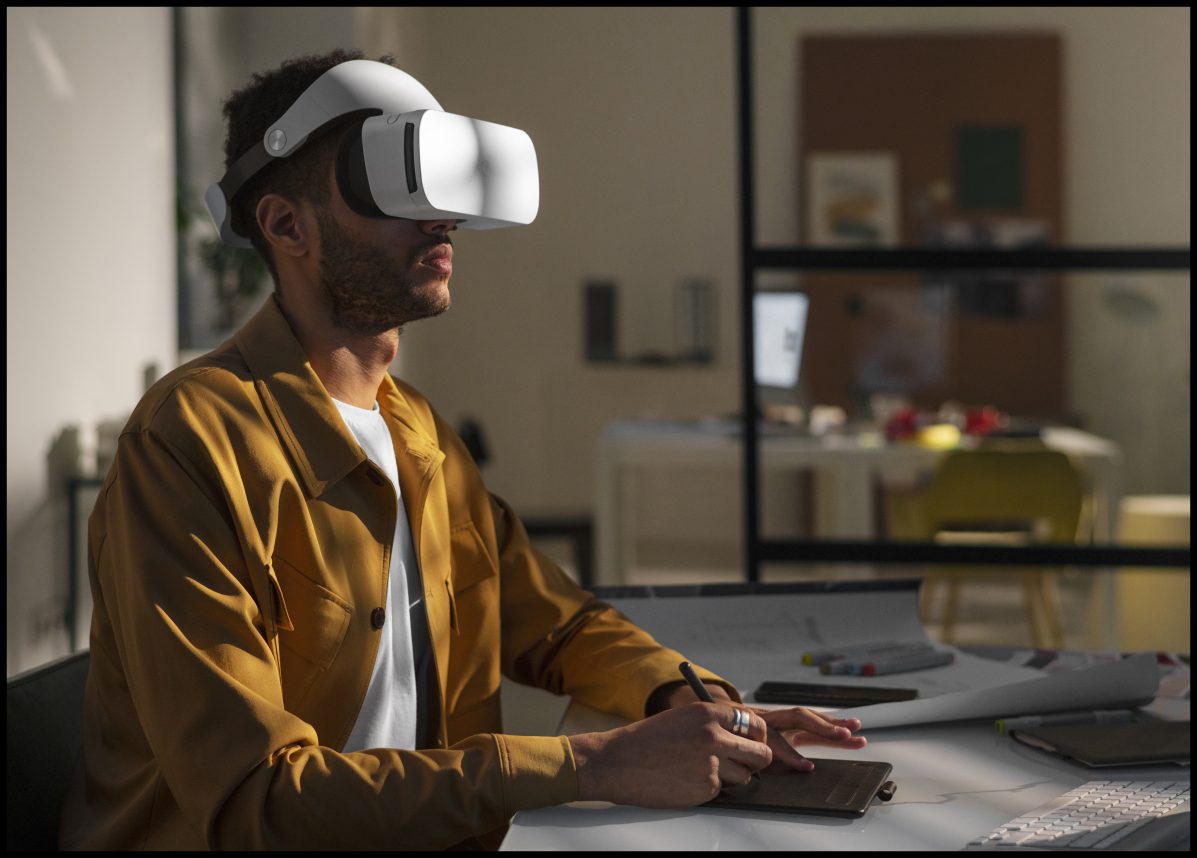 A designer is drawing with an electronic pen at his workplace with the help of virtual reality glasses. Article written by Samareh Ghaem Maghami